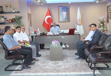 ŞUHUT KREDİ YURTLAR KURUMU MÜDÜRÜ HAKAN TÜRKMEN BELEDİYE BAŞKANIMIZ RECEP BOZKURT'U MAKAMINDA ZİYARET ETTİ..